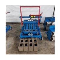 Mini machine manuelle à pression pour la fabrication de blocs de pavé, de briques et de parpaings en ciment, sable et cendres