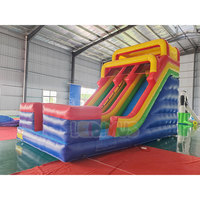 Château Gonflable Aquatique Extérieur Rouge et Bleu pour Enfants avec Double Toboggan et Souffleur