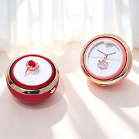 Boîte à fleurs rotative mécanique ronde personnalisée avec logo imprimé, étui à bague en velours, fournisseur en gros