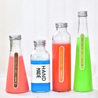 Bouteille en verre normale pour boissons, jus de fruits, confiture avec bouchon en étain vissé et couvercle en bois