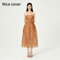 Robe de soirée moulante mi-longue sans bretelles en maille à sequins marron doré, idéale pour les banquets et cocktails – Nouvelle collection très prisée