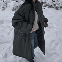 Manteau long matelassé en coton pour femme, style parka chic d'hiver, coupe ample avec cordon de serrage et col montant, chaud et douillet