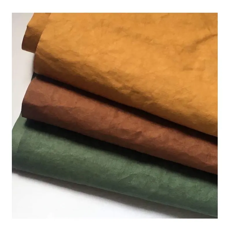 ZHICAI Eco-Friendly Washable Kraft Paper Fashion Customized 340 GSM Embossed Washable Kraft Paper Fabric Leather for Jean Label