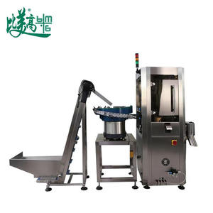 Équipement automatique de contrôle qualité des bouchons de bouteilles, alliant mesure dimensionnelle, détection des taches et inspection des dommages, efficace et durable - Product Image 1