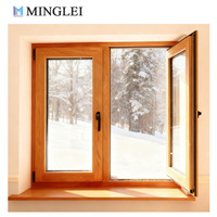 Ventanas Oscilobatientes de Aluminio y Madera de Nogal Macizo con Triple Acristalamiento con Recubrimiento Low-E y Relleno de Gas Argón