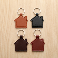 Porte-clés en forme de maison en cuir PU, portable, multifonctionnel, décoratif, breloque promotionnelle pour sac, cadeau pour agents immobiliers