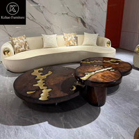 Ensemble de tables basses de luxe italiennes en bois de palissandre avec incrustations en laiton, table centrale ronde irrégulière pour salon de villa