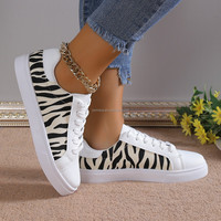 Chaussures de skateboard en cuir PU blanc vierge avec logo personnalisé FC-076 pour femmes chaussures de marche plates décontractées à lacets baskets de sport