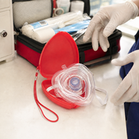 Masque de RCP jetable multicolores personnalisé avec valve unidirectionnelle, écran facial de RCP, barrière de réanimation bouche à bouche pour les premiers secours