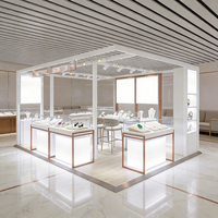 Vitrine à bijoux de luxe XINYI, cadre doré, verre verrouillable, éclairage LED, design écologique pour la vente de bijoux, shopping de luxe