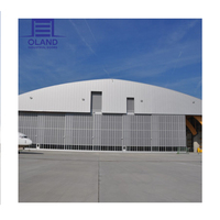 Porte de hangar industrielle coulissante automatique en acier isolé chinois OLAND avec fonction coupe-vent et ouverture latérale électrique