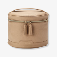 Pochette de maquillage personnalisée en cuir végétalien, trousse de toilette de voyage ronde, faible MOQ, sac cosmétique pas cher avec pompon