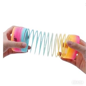 Büyük Jumbo plastik gökkuşağı daire oyuncak çocuklar için 5 ila 7 klasik için sihirli Slinkying bahar bobin oyuncak - Product Image 1