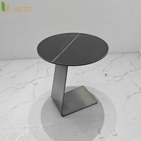 Table basse ronde de luxe U-best avec base en métal doré et plateau en marbre pour la décoration des hôtels, des halls, des bars et des restaurants