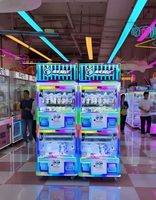 Machine à griffes d'arcade à monnayeur pour 4 joueurs, très rentable, avec distributeur de cadeaux et rangement supérieur