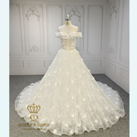 Robe de mariée QUEENS GOWN, style princesse, épaules dénudées, taille basque, avec baleines apparentes et fleurs 3D, élégante