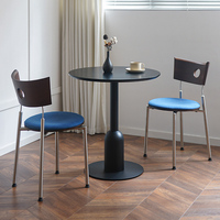 Table à manger ronde moderne Botai de style nordique, plateau en MDF, base en alliage d'acier, 4 places, résistante à l'eau, meubles pour la maison, café, salon de thé