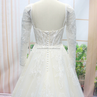 Robe de mariée de luxe Aline brodée de sequins scintillants à manches longues, style moderne, nouvelle collection, longueur ras du sol
