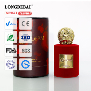 Botella de Perfume Redonda de Lujo Personalizada para Mujer, Botella de Perfume de Terciopelo de 30 ml y 50 ml con Tapa Dorada y Caja - Product Image 1