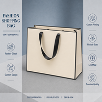 Sac en papier noir crème tendance avec logo personnalisé, poignée en ruban satiné, sac cadeau de luxe pour boutique de vêtements et articles vestimentaires