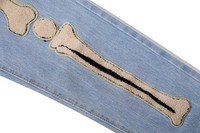 BUFA Vente en gros personnalisée de jeans unisexes en denim, streetwear hip-hop, pantalon droit ample, logo de crâne, patchs brodés, jeans en denim pour hommes