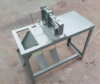 Machine manuelle de séparateur de noyaux et de coquilles de noix de cajou de commande au pied