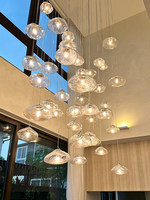 Lustre en verre soufflé à la main de style nordique personnalisé, luminaire suspendu moderne en forme de bulle pour hall d'hôtel, villa, escalier, salon