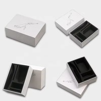 Boîte cadeau en papier blanc de luxe réutilisable en forme de livre magnétique personnalisée avec un emballage de mode haut de gamme