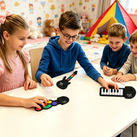 Mini Silicone Electronic Musical Instrument Toy Portable Piano Guitar Keychain Creative Finger Play Pocket Music Toy for Kids