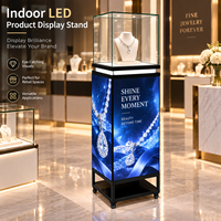 Présentoir numérique LED de luxe pour intérieur avec vitrine en verre illuminée et écran publicitaire personnalisé pour les boutiques de parfums