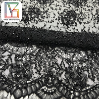 Tissu de dentelle à paillettes de luxe en dentelle française noire de haute couture pour robe de mariée