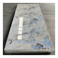 Tablero de PVC con Efecto Mármol Azul Roma Europeo, 2800x1220mm, Acabado Espejo, Ligero, para Oficinas y Espacios Comerciales