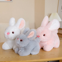 Vente en gros de poupée en peluche de lapin de simulation mignon lapin unisexe réaliste rempli de coton PP cadeau de Pâques pour les filles