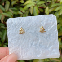 1 paire de clous d'oreille plaqués or 18 carats en cuivre de conque d'étoile de mer de style marin de style vintage