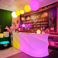 Meubles de bar et de discothèque modernes lumineux, bancs incurvés éclairés par LED à changement de couleur