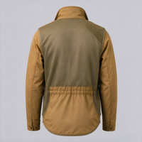 Veste de chasse aux oiseaux en montagne avec coussin de tir