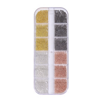 Nouveaux accessoires pour ongles transfrontaliers petites perles en acier dans une boîte longue à 12 grilles ensemble de clous en métal doré et argenté