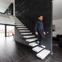 Escalier flottant moderne en granit et marbre sur mesure