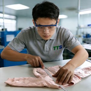 Service d'inspection de la qualité des vêtements TTS, inspection de contrôle qualité, DC112, tests industriels - Product Image 1