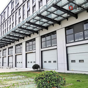 औद्योगिक स्वचालित अनुभागीय स्टील दरवाजा तैयार सतह ओवरहेड लिफ्टिंग कारखानों के लिए रोल-अप दरवाजा - Product Image 4