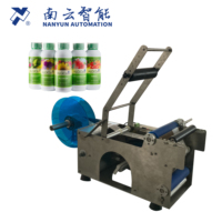 Machine d'étiquetage de bouteilles rondes semi-automatique de bureau NanYun NY-824A pour les petites entreprises, vin, bière, canettes, étiqueteuse manuelle