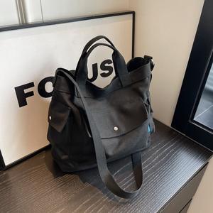 กระเป๋าผ้าแคนวาสคุณภาพสูง ความจุมาก กันน้ำ ใช้ได้ทั้งชายและหญิง สะพายไหล่ สำหรับกีฬากลางแจ้ง ฟิตเนส สินค้าขายดีจากโรงงาน - Product Image 2