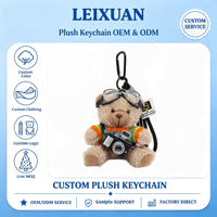 Porte-clés en peluche ours photographe avec lunettes d'appareil photo et pull multicolore, accessoire souple et portable pour sac à dos de voyage