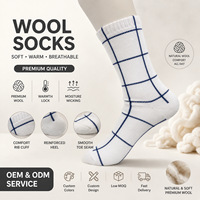 Vente en gros de chaussettes en laine mérinos unisexes personnalisées avec logo OEM, chaussettes en laine chaudes personnalisées pour hommes et femmes