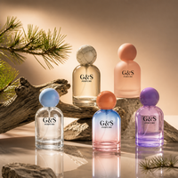 Flacon de parfum en verre de luxe personnalisé de 50 ml, bouchon rond, conteneur de parfum vide