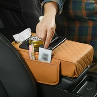 Boîte de rangement pour accoudoir central avant de voiture avec coussin rehausseur en cuir intégré, porte-gobelet et pochette de rangement pour mouchoirs pour les voyages en voiture