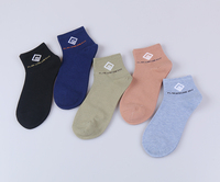 Chaussettes pour femmes d'affaires à côtes hautes et à motif discret