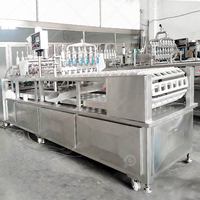 Machine de remplissage et de scellage pour pots de confiture, cubes de glace, petits pots de yaourt et autres emballages en plastique (type Honey Plastic Trade)