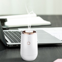 Diffuseur de parfum USB compact à pulvérisation mécanique pour voiture, type brume, pour porte-gobelet, avec huiles essentielles en gros