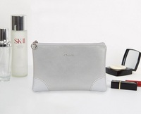 Sac à cosmétiques en cuir PU verni bon marché pour hommes, organisateur de toilette promotionnel imperméable pour femmes, pochette à fermeture éclair plate classique pour cosmétiques